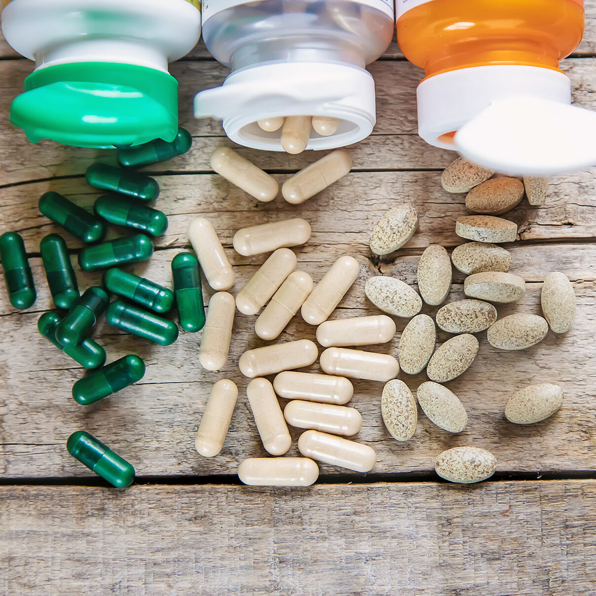 capsules-jars-table-selective-focus